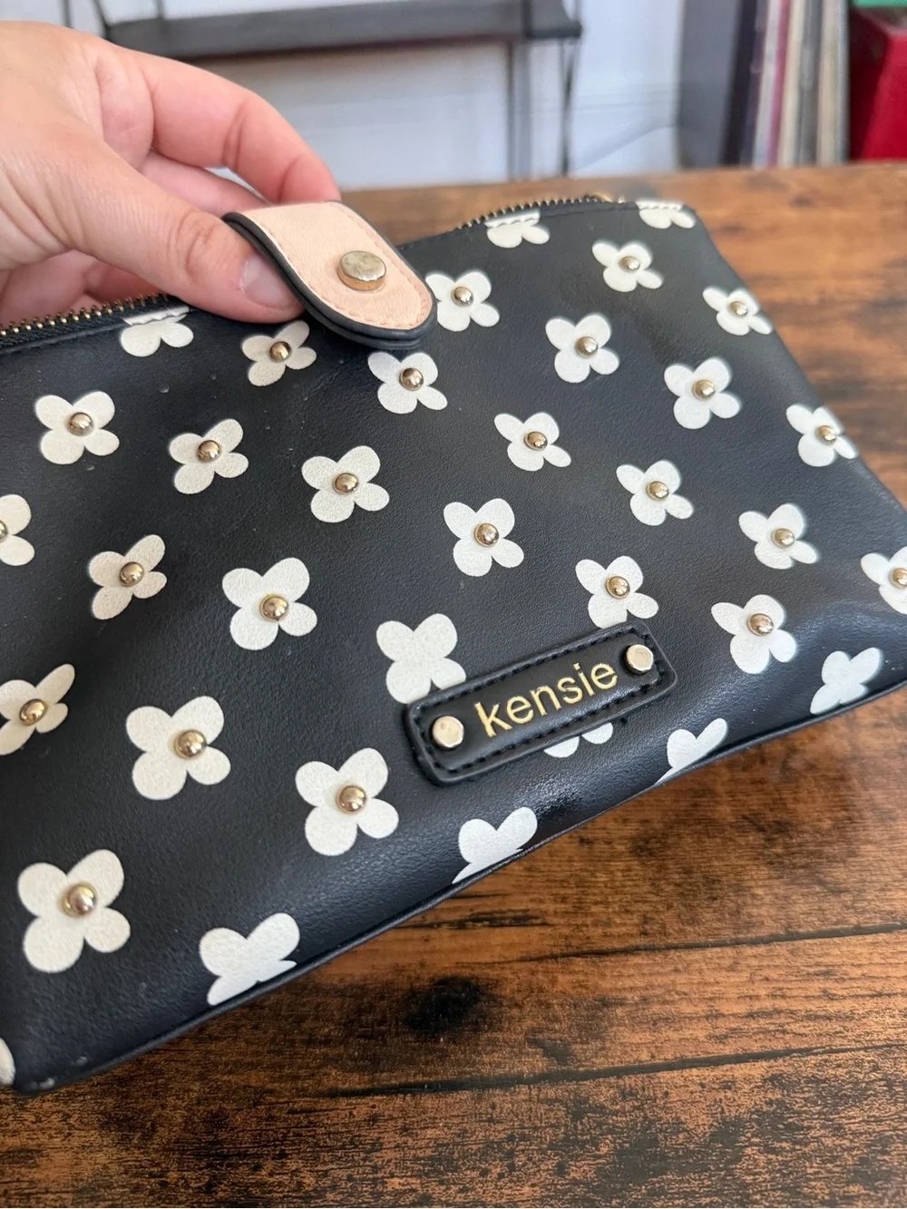 Kensie Black and Cream Floral Zip Wristlet with Tan Snap Strap